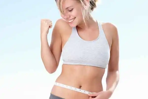 woman happy after fat reduction treatment Chapel House